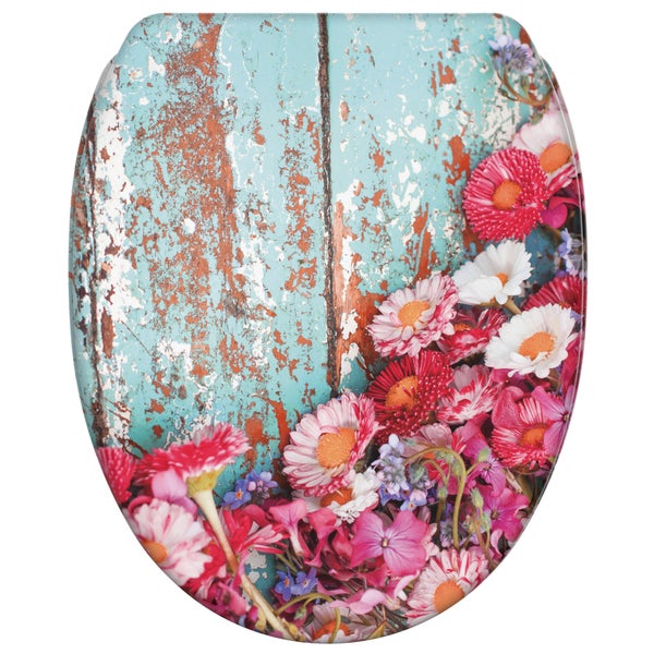 Toilettensitz mit aufgedrucktem Blumenmotiv auf Vintage Holzoptik Hintergrund