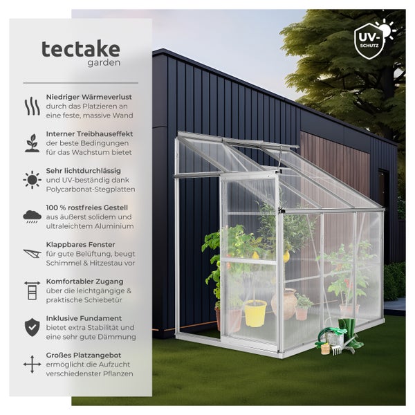 Gewächshaus mit Pflanzen und Gartengeräten