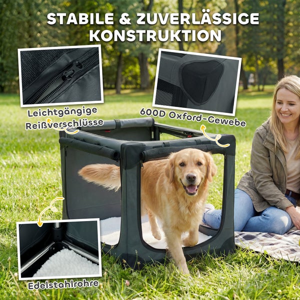 Stabile Hundetransportbox auf einer Wiese mit einem Golden Retriever und Details zu Edelstahlrohren, 600D Oxford-Gewebe und Reißverschlüssen.