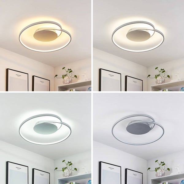 Moderne LED Deckenleuchte in verschiedenen Farbtemperaturen von warmweiß bis kaltweiß, rundes Ringdesign in einem hellen Raum.