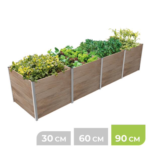 Hochbeet in Holzoptik mit silbernen Eckprofilen, bepflanzt mit grünem Gemüse, Höhe 90 Zentimeter.