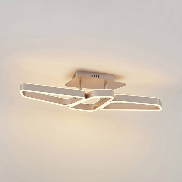Moderne LED-Deckenleuchte aus Metall mit zwei ineinander verschlungenen, rechteckigen Leuchtelementen.