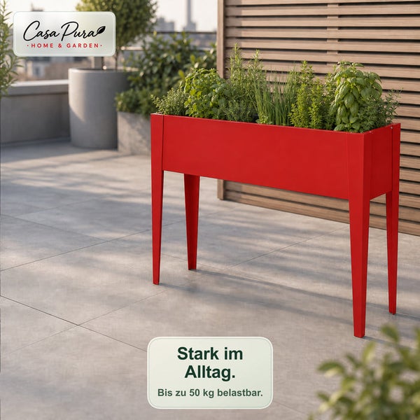 Rotes Metall-Hochbeet mit Kräutern auf einer Terrasse. Casa Pura Logo, Belastbarkeit bis zu 50 Kilogramm.
