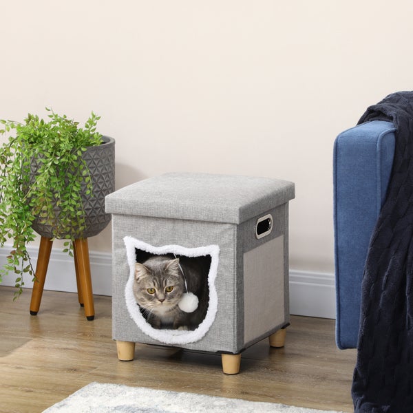 Grauer Katzenhocker mit Katzenloch und Katze