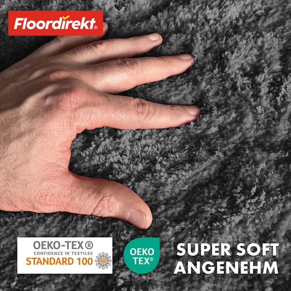 Hand berührt hochflorigen Teppich mit den Siegeln Oeko-Tex Standard 100 und Oeko-Tex, Aufschrift Super Soft Angenehm