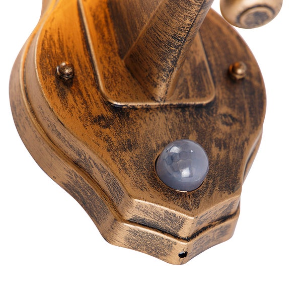 Wandlampen-Halterung mit Bewegungsmelder in antikem Gold-Design.