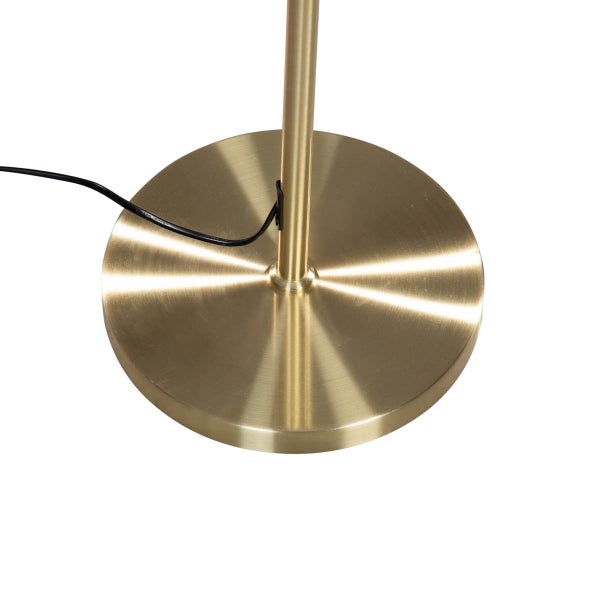 Detailaufnahme des runden Sockels einer Stehlampe aus Metall