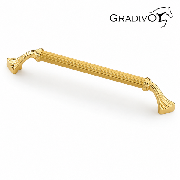 Gradivo Logo. Goldfarbener Möbelgriff aus Metall mit feinen Längsrillen.