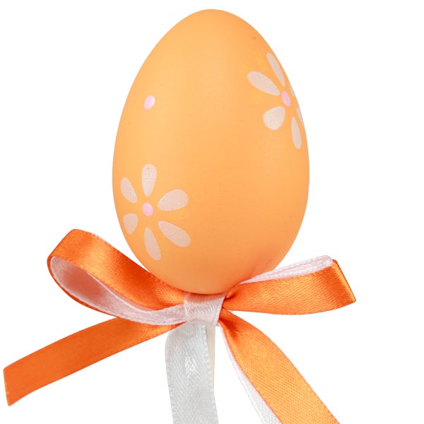 Dekoratives Osterei mit Schleife und Blumenmuster