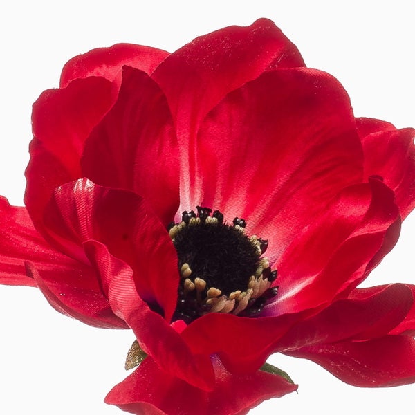 Künstliche Anemone in Rot aus Textilmaterial mit dunkler Mitte.