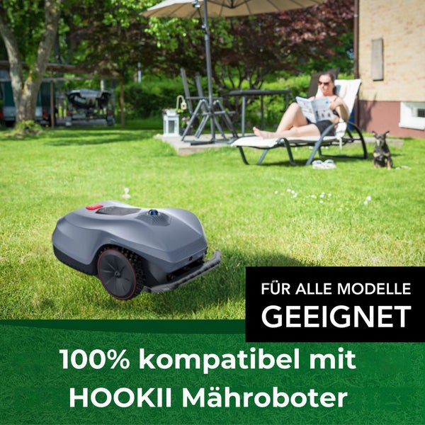 HOOKII Mähroboter auf Rasen, im Hintergrund eine Frau auf einer Liege