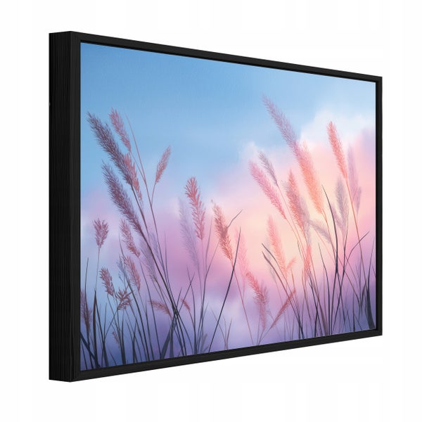 Gerahmtes Wandbild mit schwarzem Rahmen, Motiv Gräser vor einem pastellfarbenen Himmel in Blau und Rosa.