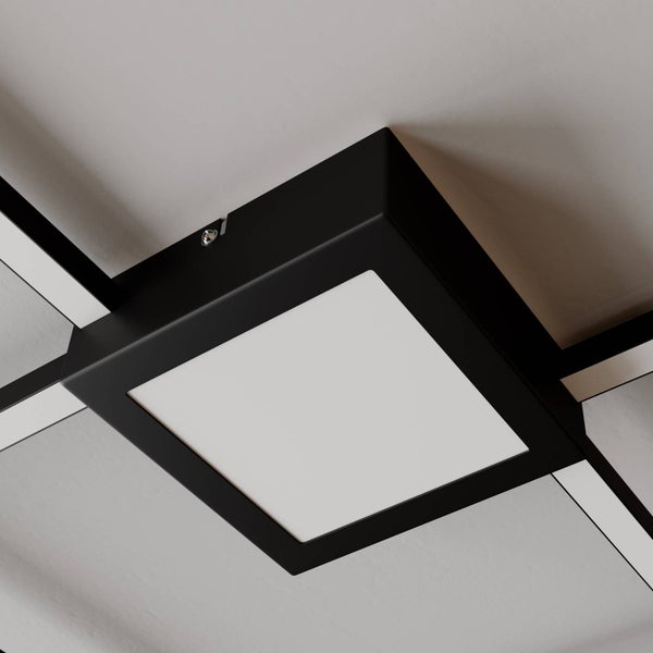 Moderne LED-Deckenleuchte mit quadratischem schwarzem Rahmen und weißer Lichtfläche.