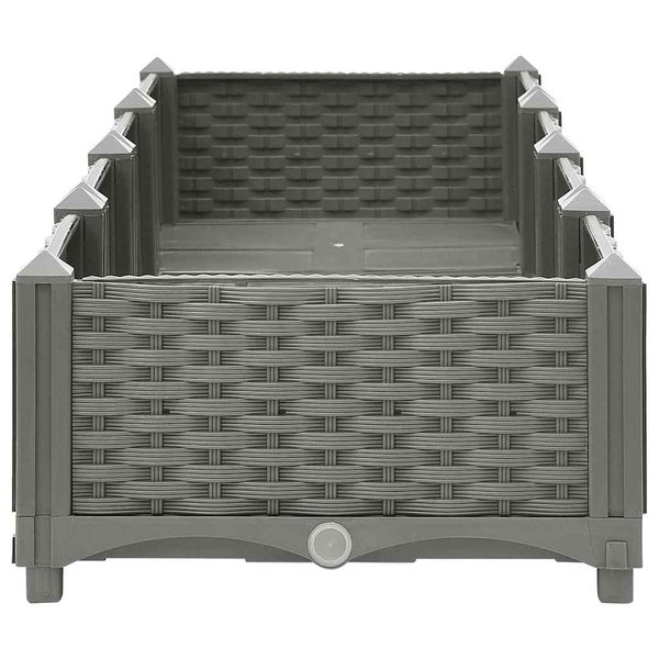 Graues rechteckiges Hochbeet aus Kunststoff in Rattan-Optik.