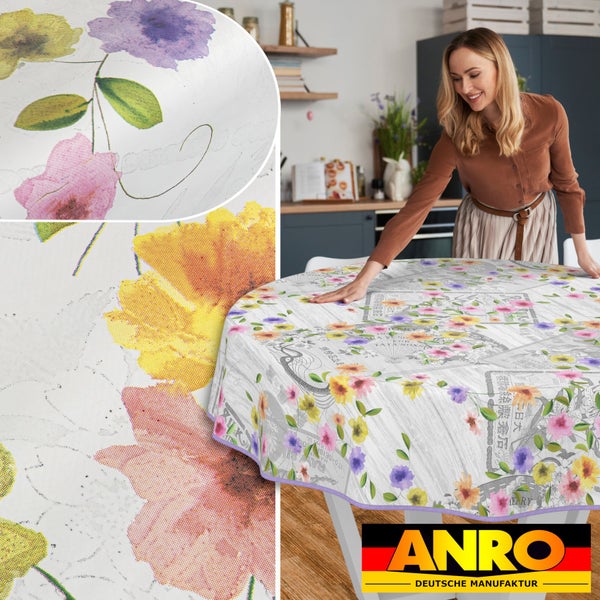 Frau legt runde Tischdecke mit Blumenmuster auf Tisch; ANRO Logo