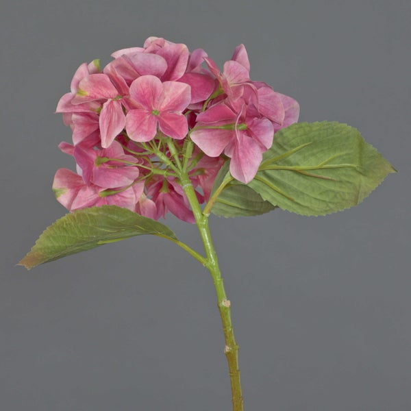 Künstliche Hortensie mit rosa Blütenkopf und grünem Stängel.