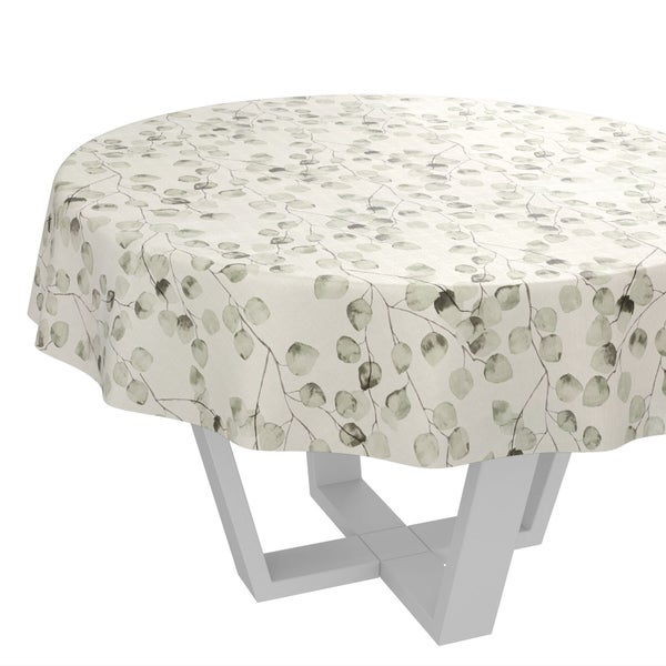 Runde Tischdecke mit Eukalyptus-Blättermuster auf einem modernen Tischgestell.