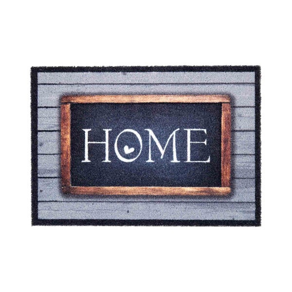 Fußmatte mit der Aufschrift Zuhause und Herzsymbol