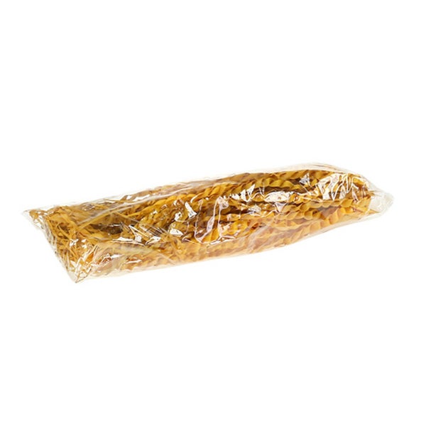 Spiralförmige Holzwolle in transparenter Kunststoffverpackung.