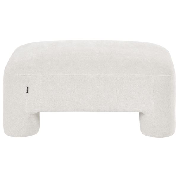 Gepolsterter Hocker aus beigem Stoff mit abgerundeten Ecken und integrierten Füßen.