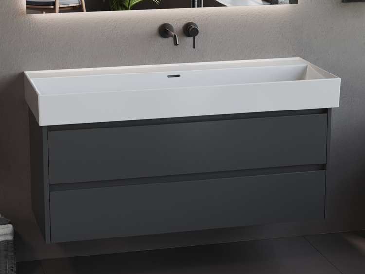 Waschtisch mit Unterschrank und zwei Schubladen im Badezimmer.