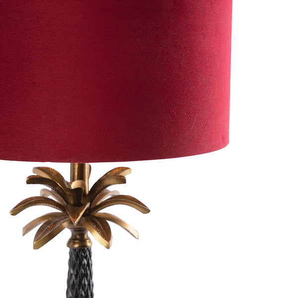 Tischleuchte mit Schirm und dekorativem Fuß im Palmenstil