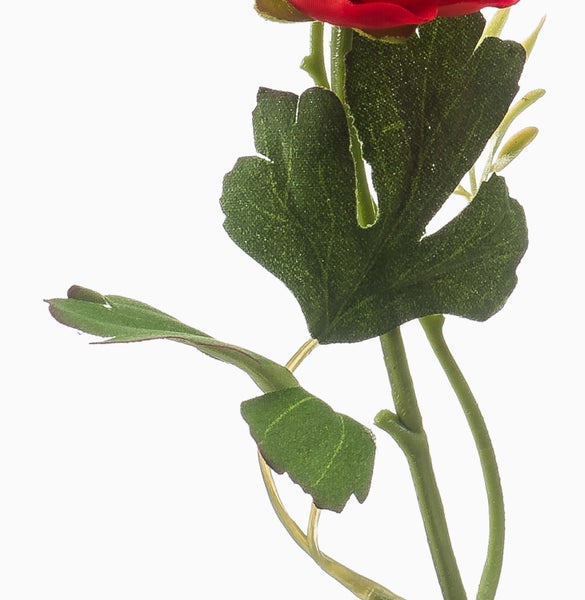 Detailaufnahme einer Kunstpflanze mit gedrehtem braunem Stamm und dünnen Wurzeln in einem dunklen Kunststofftopf.