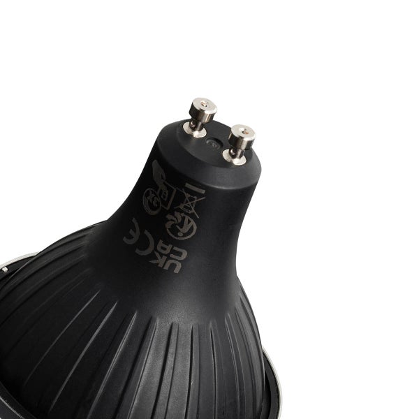 Schwarzes LED Leuchtmittel mit GU10 Sockel, zwei Metallstiften, Konformitätskennzeichnungen und Entsorgungssymbol.