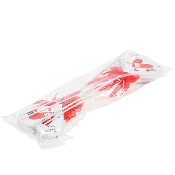 Verpackung mit Herzstäben mit Schleifen für Dekorationen