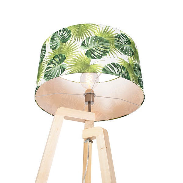 Stehlampe mit Lampenschirm mit tropischen Pflanzenmotiven und Holzfuß