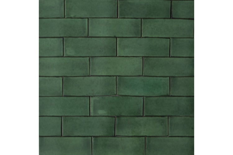 Wandfliese in grüner Brick-Optik mit glänzender Oberfläche im Metro-Stil.