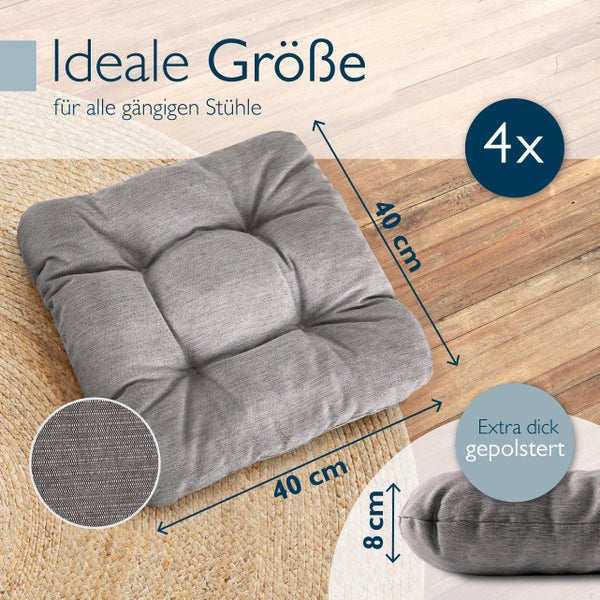 Vier graue Stuhlkissen, jeweils 40 mal 40 Zentimeter groß und 8 Zentimeter dick