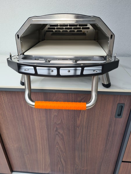 Edelstahl Handtuchwärmer mit orangem Griff