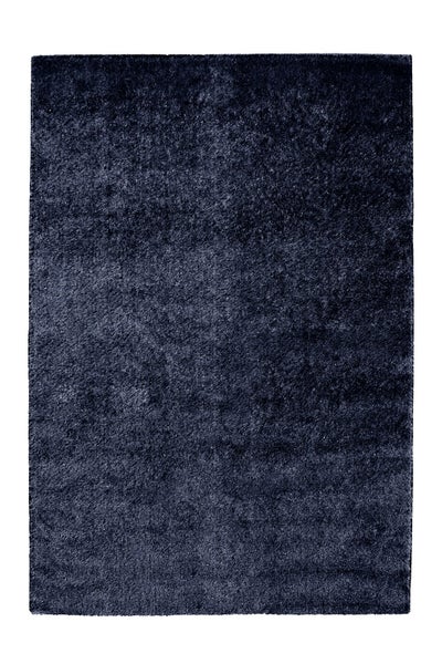 Dunkelblauer rechteckiger Hochflor-Teppich mit weicher dichter Textur.
