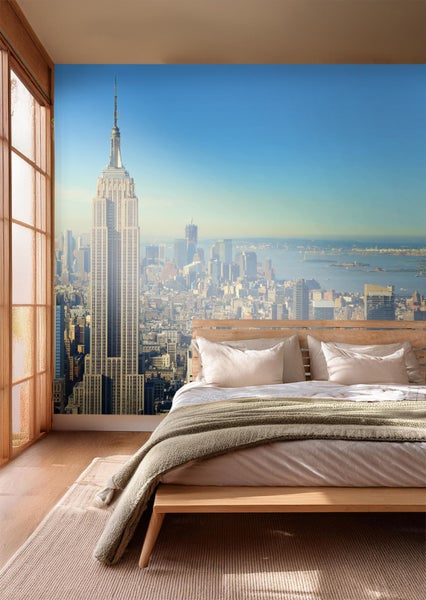 Schlafzimmer mit Fototapete einer New Yorker Skyline mit dem Empire State Building