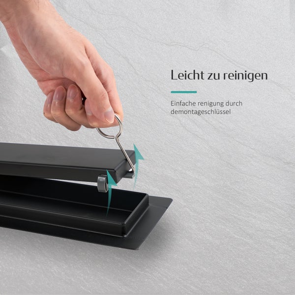 Reinigung einer Duschrinne mit Demontageschlüssel