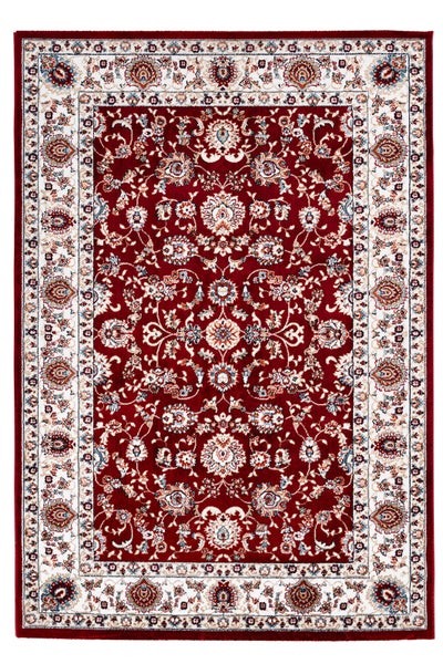 Klassischer Orientteppich mit floralem Muster und Bordüre in Rot und Weiß.