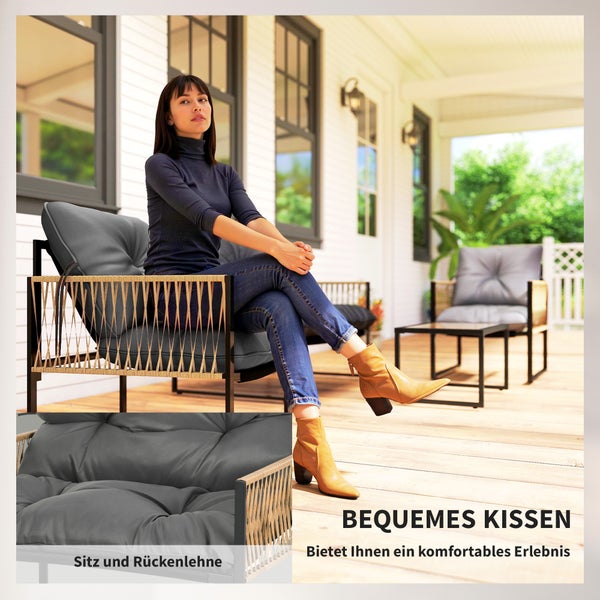 Moderner Garten-Lounge-Sessel mit schwarzem Metallrahmen, beiger Seilbespannung und grauen Polstern auf einer hellen Holzterrasse.