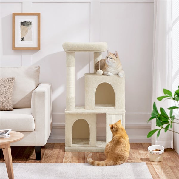 Katzenkratzbaum mit zwei Katzen in einem hellen Raum