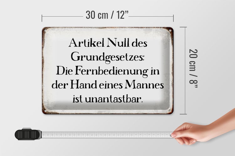 Blechschild Spruch 30x20cm Fernbedienung in der Hand Mannes