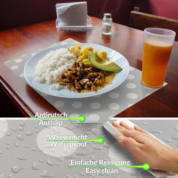 Platzset grau mit weißen Punkten auf einem Holztisch, rutschfest, wasserdicht und leicht zu reinigen.
