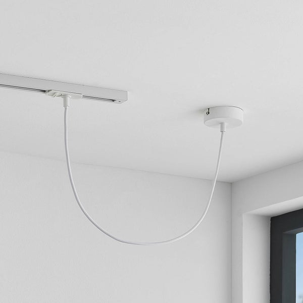 Weiße flexible Stromeinspeisung für Schienensysteme, montiert an der Decke.