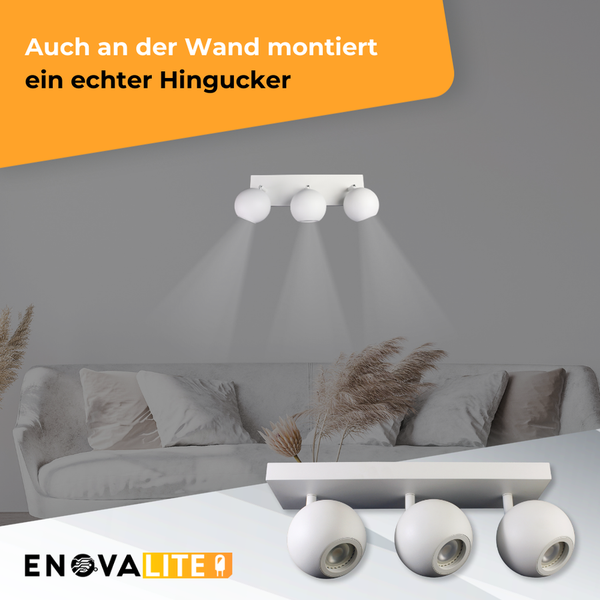 Wandleuchte mit drei Strahlern im Wohnzimmer