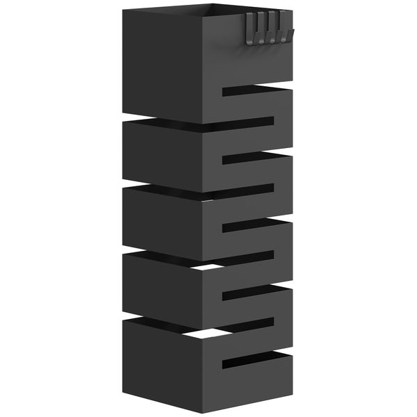 Schwarzer Kaminholzständer aus Metall mit Zickzack-Muster und vier Haken am oberen Rand.