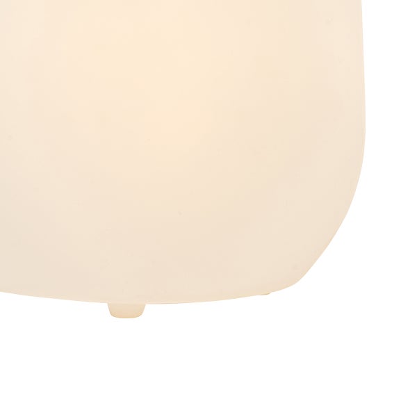 Abgerundete, lichtdurchlässige Tischlampe aus Kunststoff in modernem Design, von innen beleuchtet.