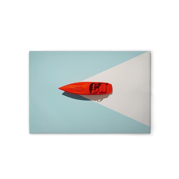 Dekorative Leinwand mit einem roten Spielzeugbootmotiv