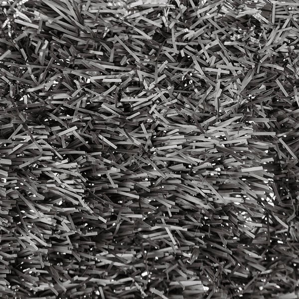 Nahaufnahme einer Sichtschutzmatte aus Kunststoff mit vielen flachen, übereinanderliegenden Streifen.