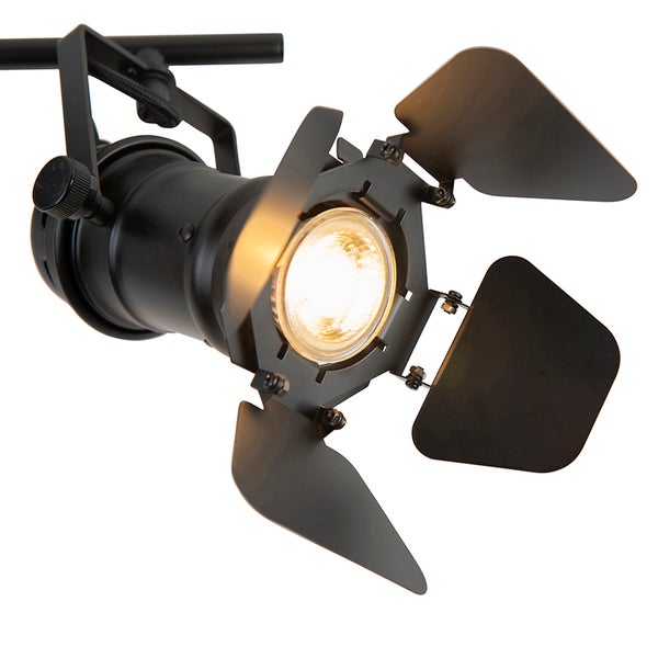 Schwarzer Scheinwerfer mit verstellbaren Abschirmklappen