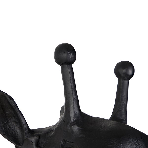 Detailaufnahme einer dekorativen Tierfigur aus Metall