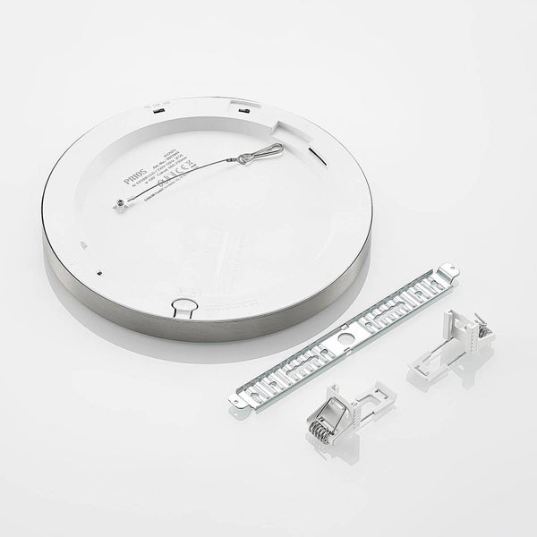 Rundes Prios LED-Einbaupanel, Rückansicht mit Montagematerial wie Haltebügel und Federklammern, Gehäuse aus gebürstetem Metall.